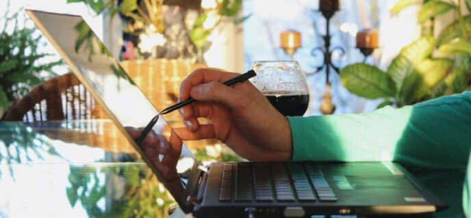 Remote worker using MiCollab on their tablet Towner Communications and Mitel