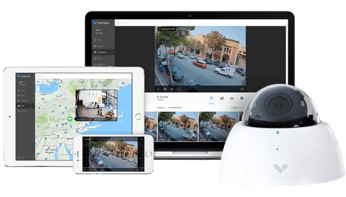 Verkada cloud-based security camera system displayed on a laptop, tablet, and smartphone, providing real-time video monitoring and AI-powered surveillance insights.